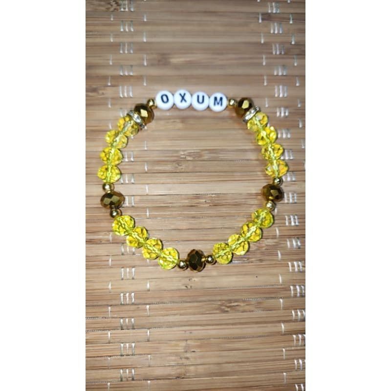 Pulseira de Proteção Artesanal de Oxum com Cristais Amarelos e Dourados Pulseira de Proteção Artesanal de Oxum com Cristais Amarelos e Dourados