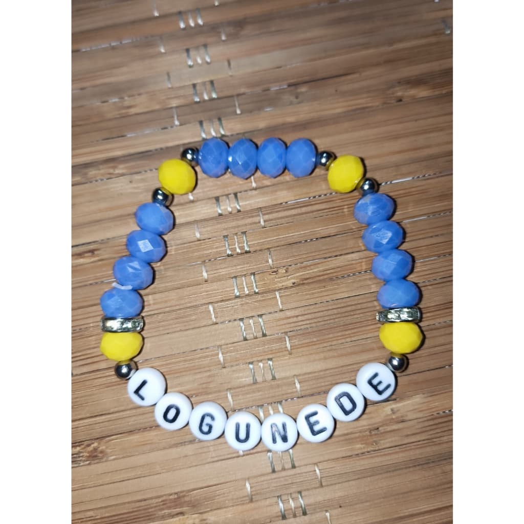 Pulseira de Proteção Artesanal de Logunedé com Cristais Azuis e Amarelos Pulseira de Proteção Artesanal de Logunedé com Cristais Azuis e Amarelos