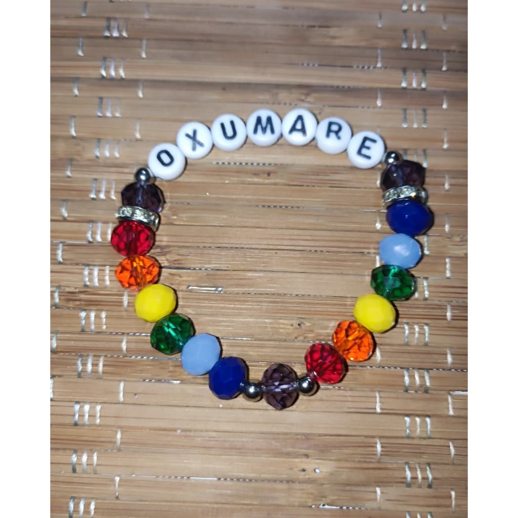 Pulseira de Proteção Artesanal de Oxumaré com Cristais Coloridos Pulseira de Proteção Artesanal de Oxumaré com Cristais Coloridos