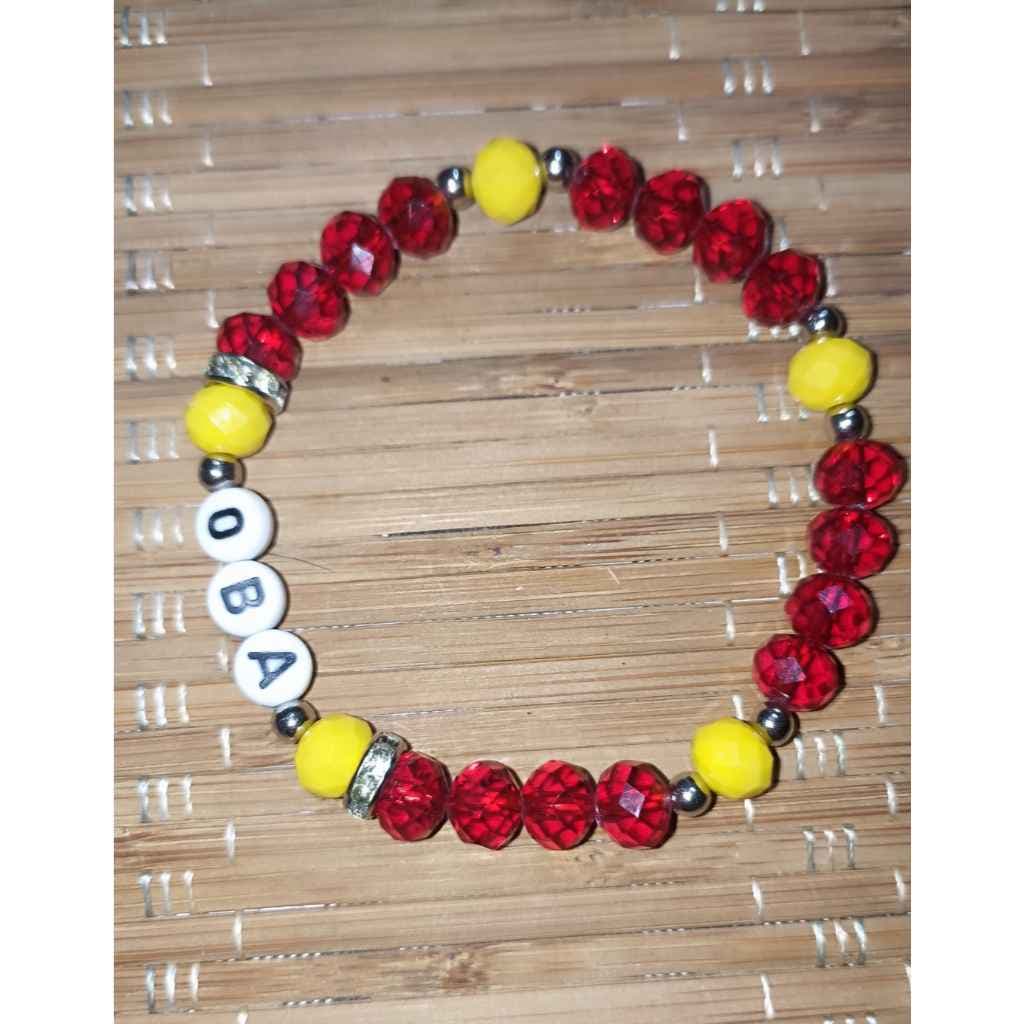 Pulseira de Proteção Artesanal de Obá com Cristais Vermelhos e Amarelos Pulseira de Proteção Artesanal de Obá com Cristais Vermelhos e Amarelos