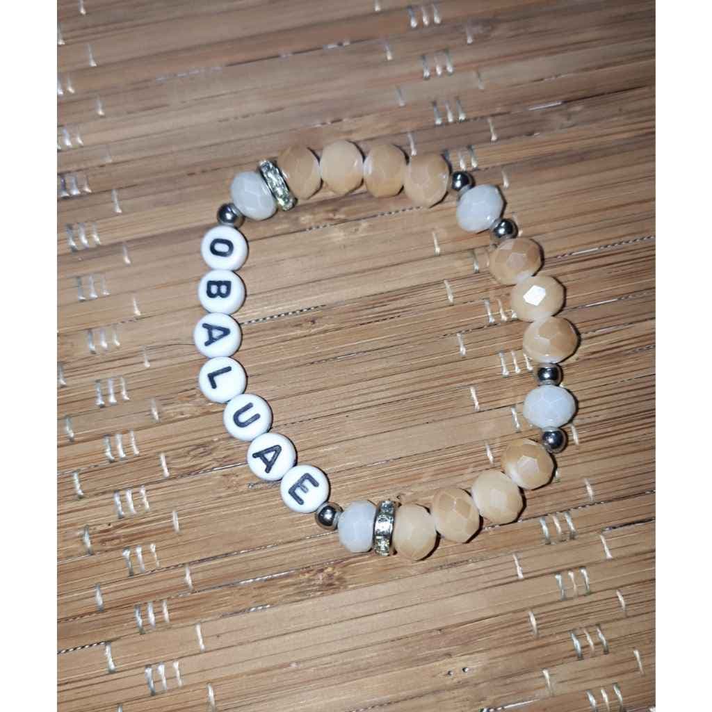 Pulseira de Proteção Artesanal de Obaluaê com Cristais Bege e Brancos Pulseira de Proteção Artesanal de Obaluaê com Cristais Bege e Brancos