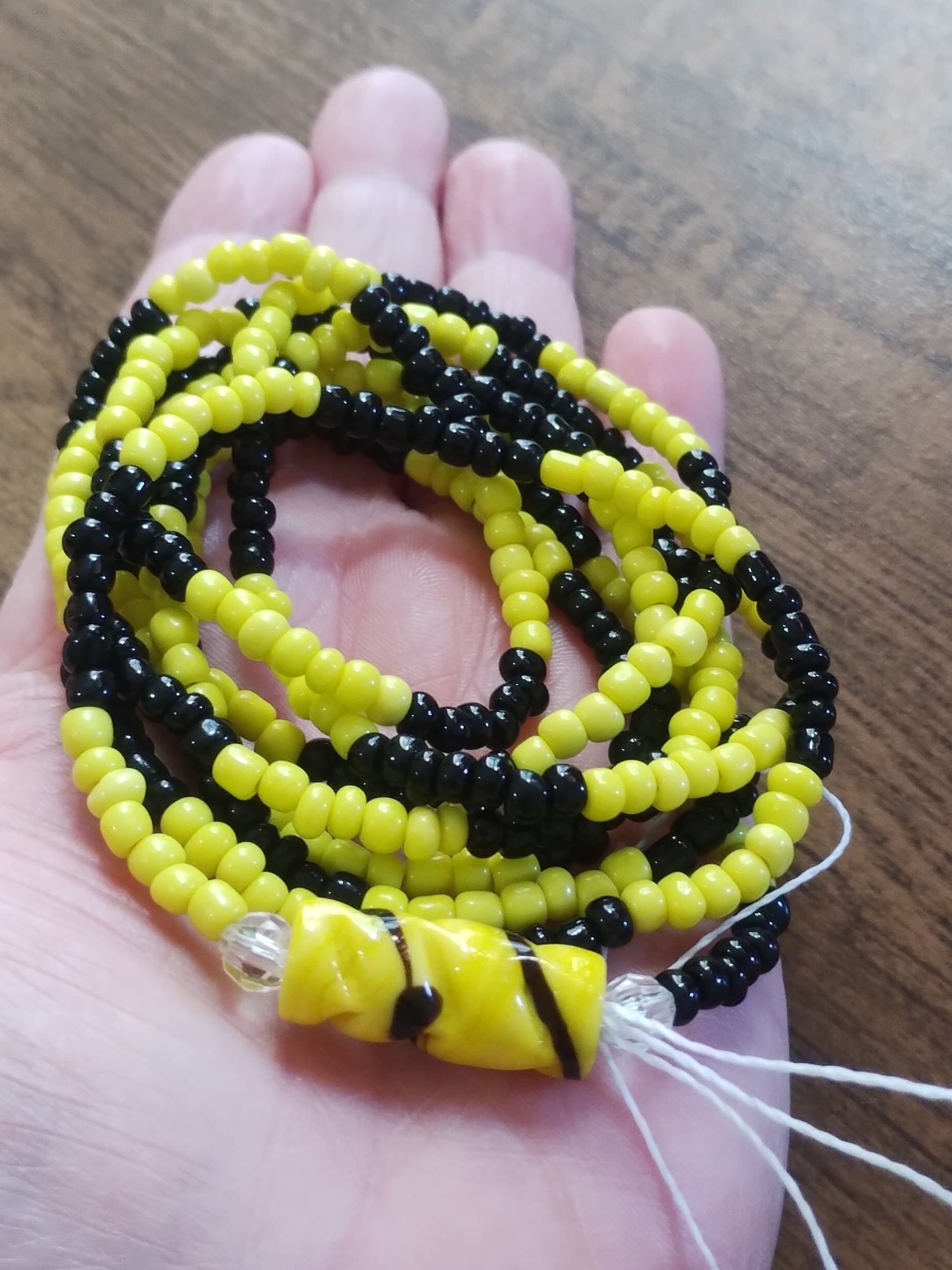 Guia / Fio de Contas nas cores Amarelo e Preto - Oxumarê Guia / Fio de Contas nas cores Amarelo e Preto - Oxumarê