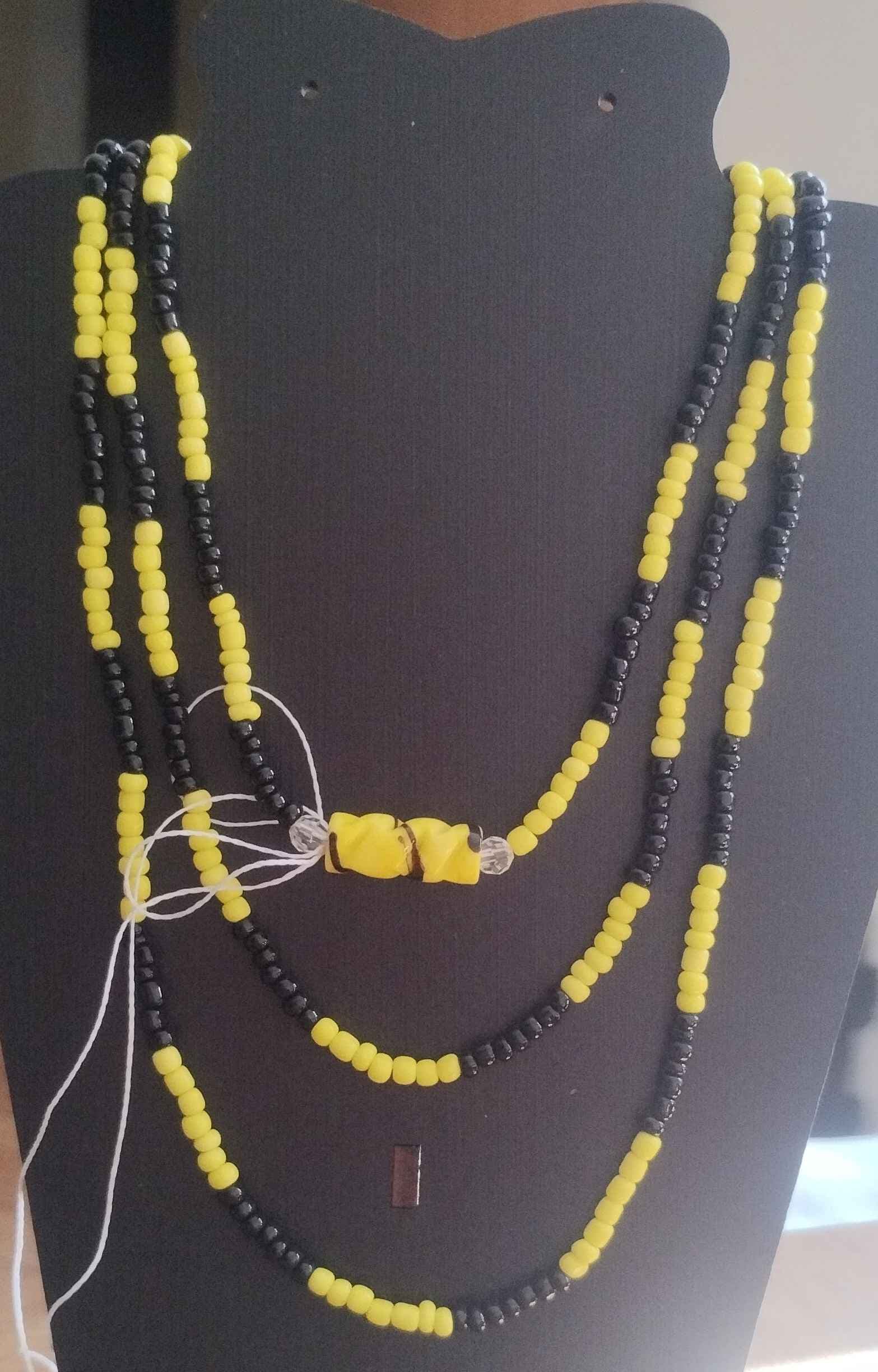 Guia / Fio de Contas nas cores Amarelo e Preto - Oxumarê Guia / Fio de Contas nas cores Amarelo e Preto - Oxumarê