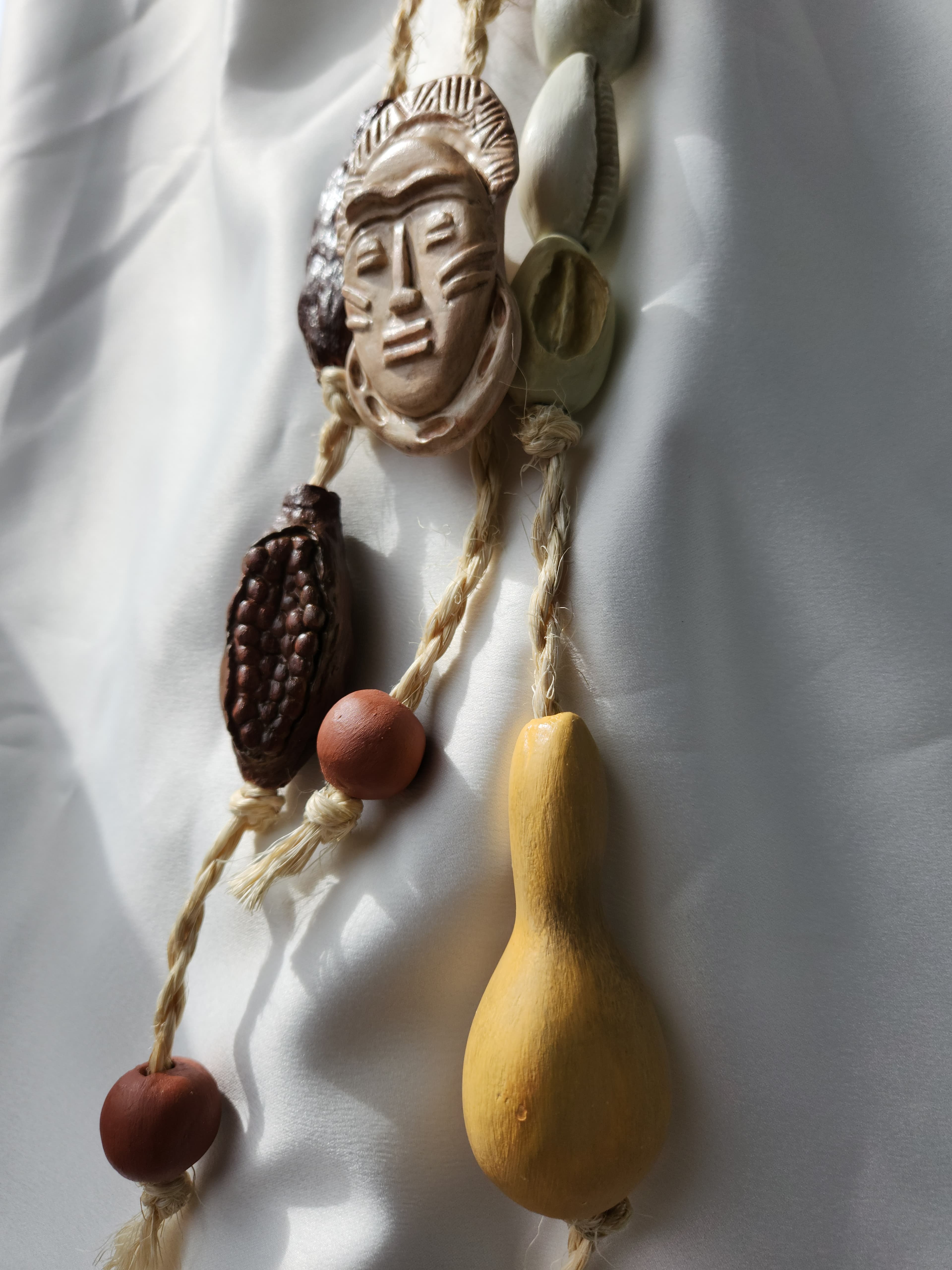 Penduricalho Ancestral Afro | Búzios, Pimenta-da-Costa e Cabaça Penduricalho Ancestral Afro | Búzios, Pimenta-da-Costa e Cabaça