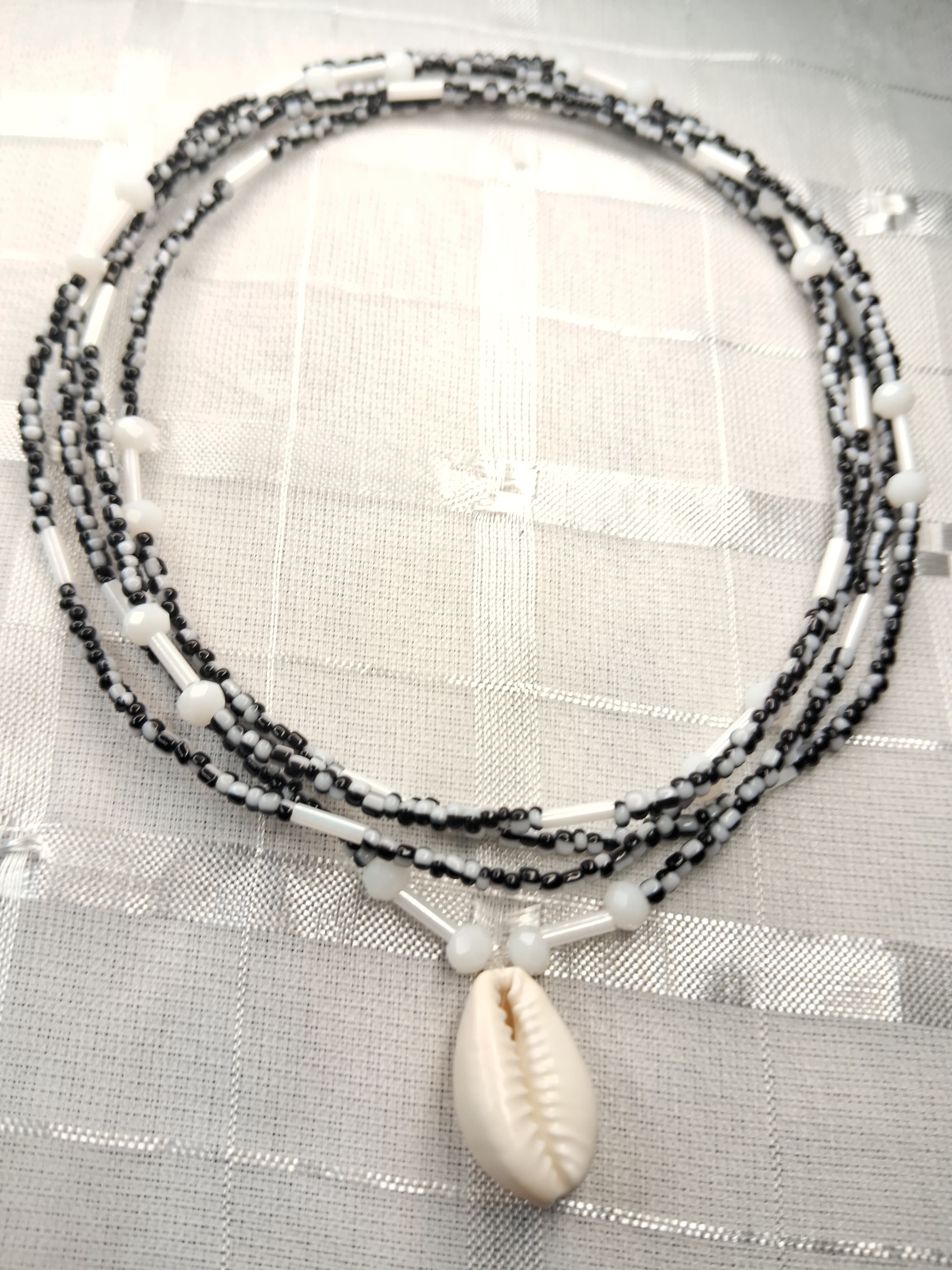 Fio fininho de Omolu com branco Fio fininho de Omolu com branco