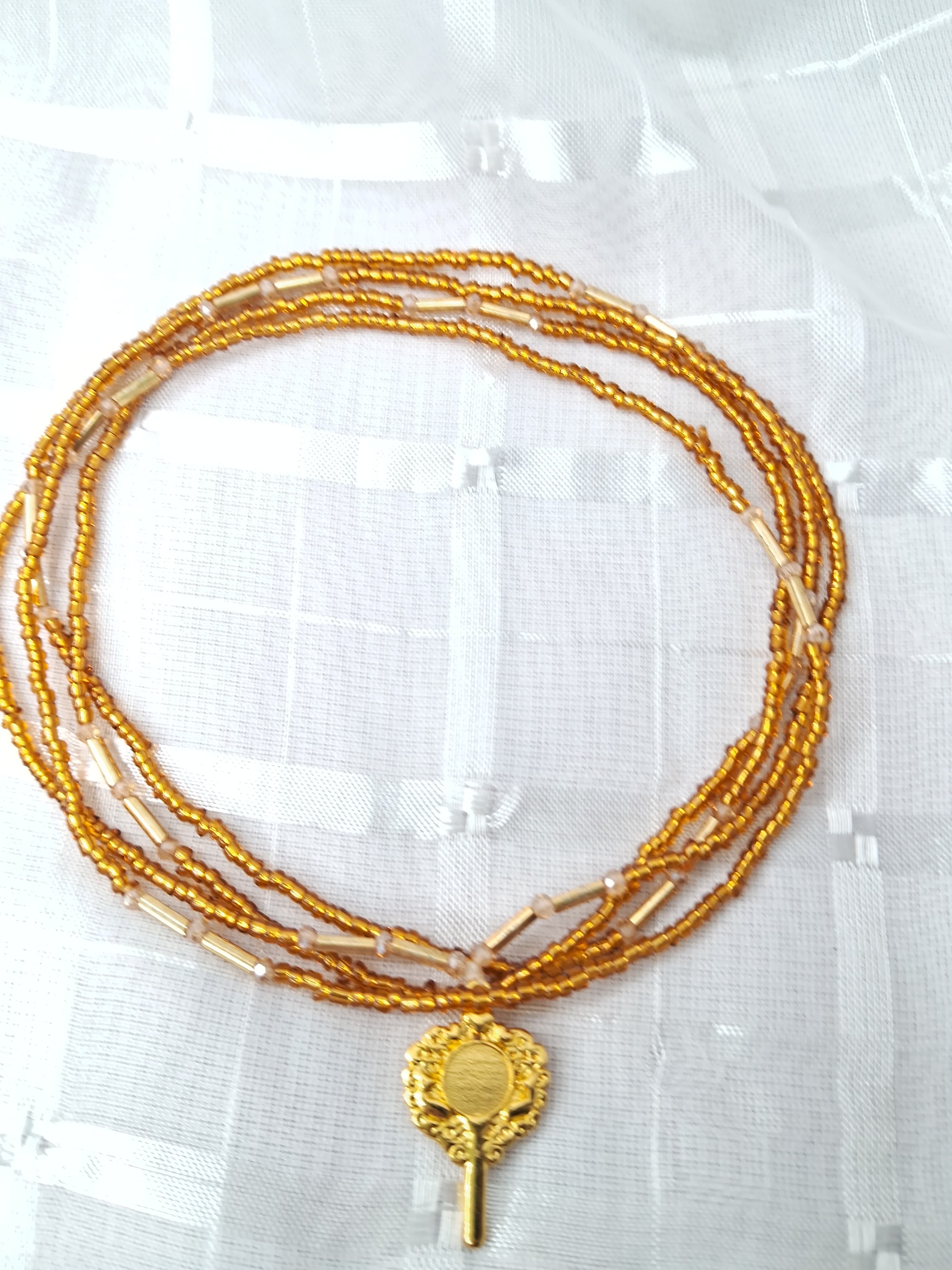 Fio de Oxum com Dourado Fio de Oxum com Dourado