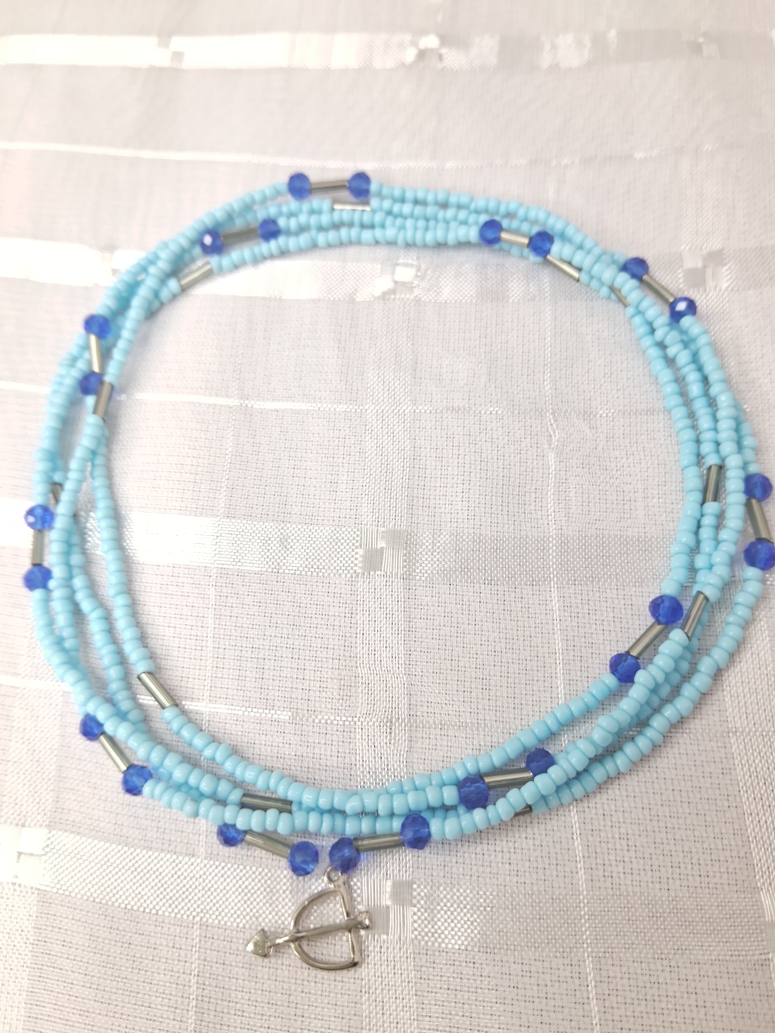 Fio de Oxossi com Azul Fio de Oxossi com Azul