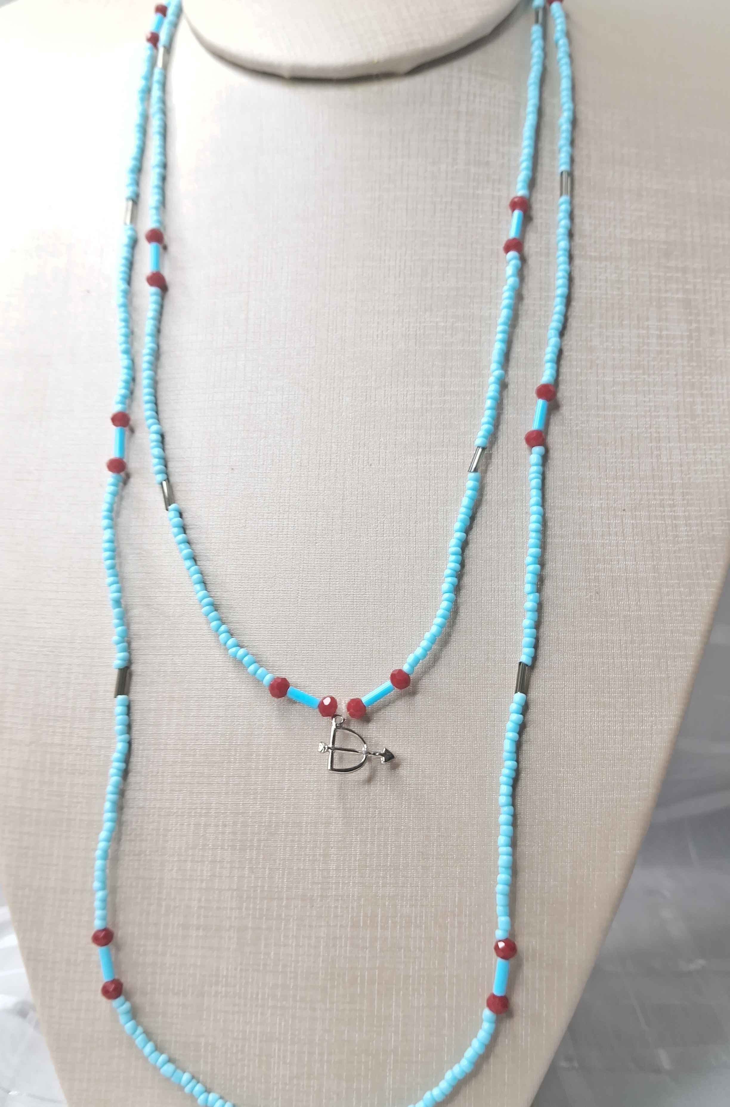 Fio de Oxossi com Vermelho Fio de Oxossi com Vermelho