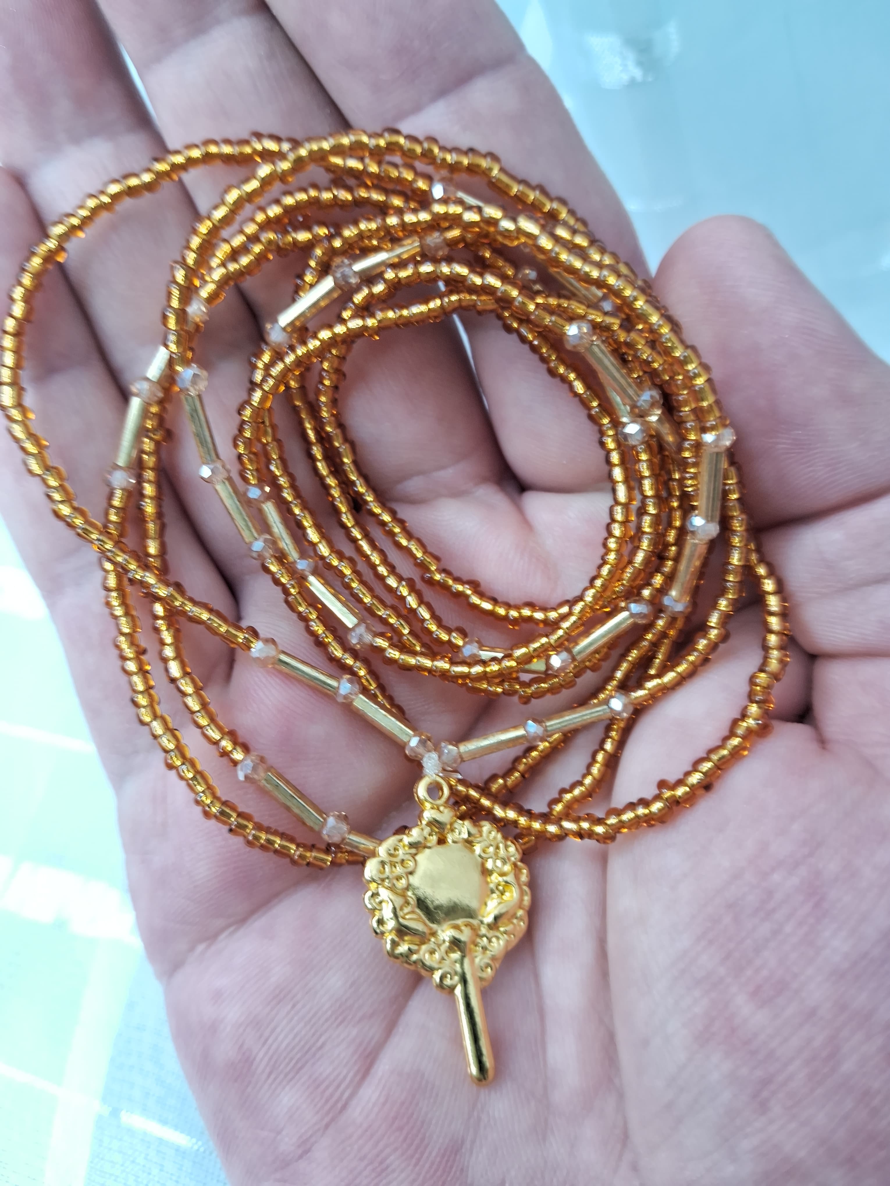 Fio de Oxum com Dourado Fio de Oxum com Dourado